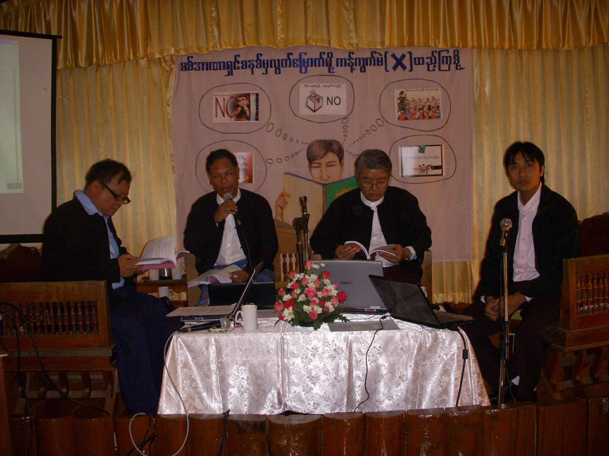 Meeting of Burma Lawyers' Council members in a wooden house